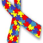 Fita de conscientização do autismo: fita de laço composta por peças coloridas de quebra-cabeça.